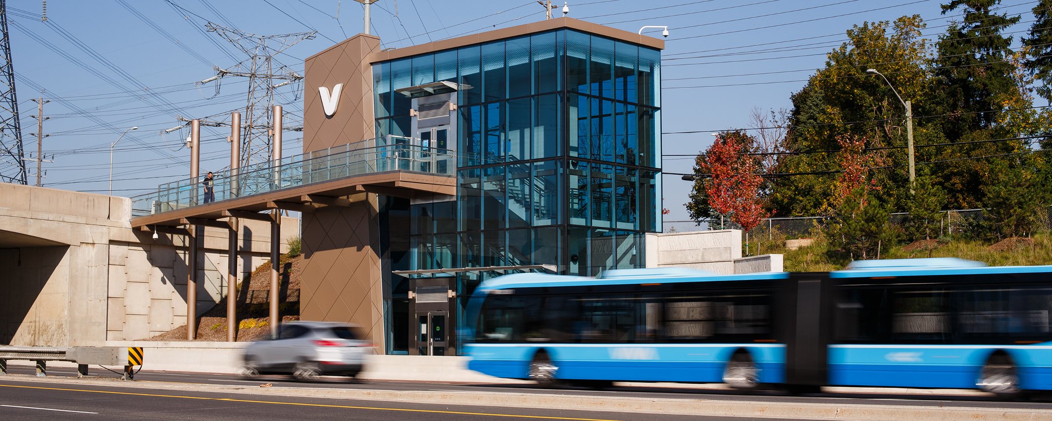 image of viva bus travelling on road in front of vivastation