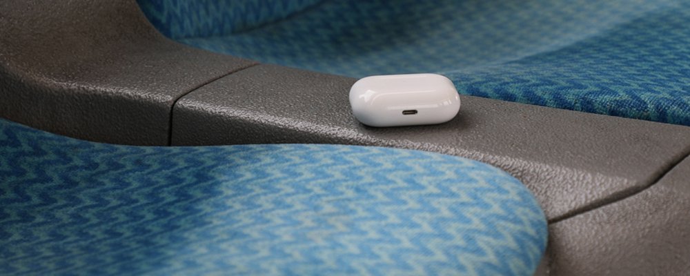 ear pods sitting on a bus seat