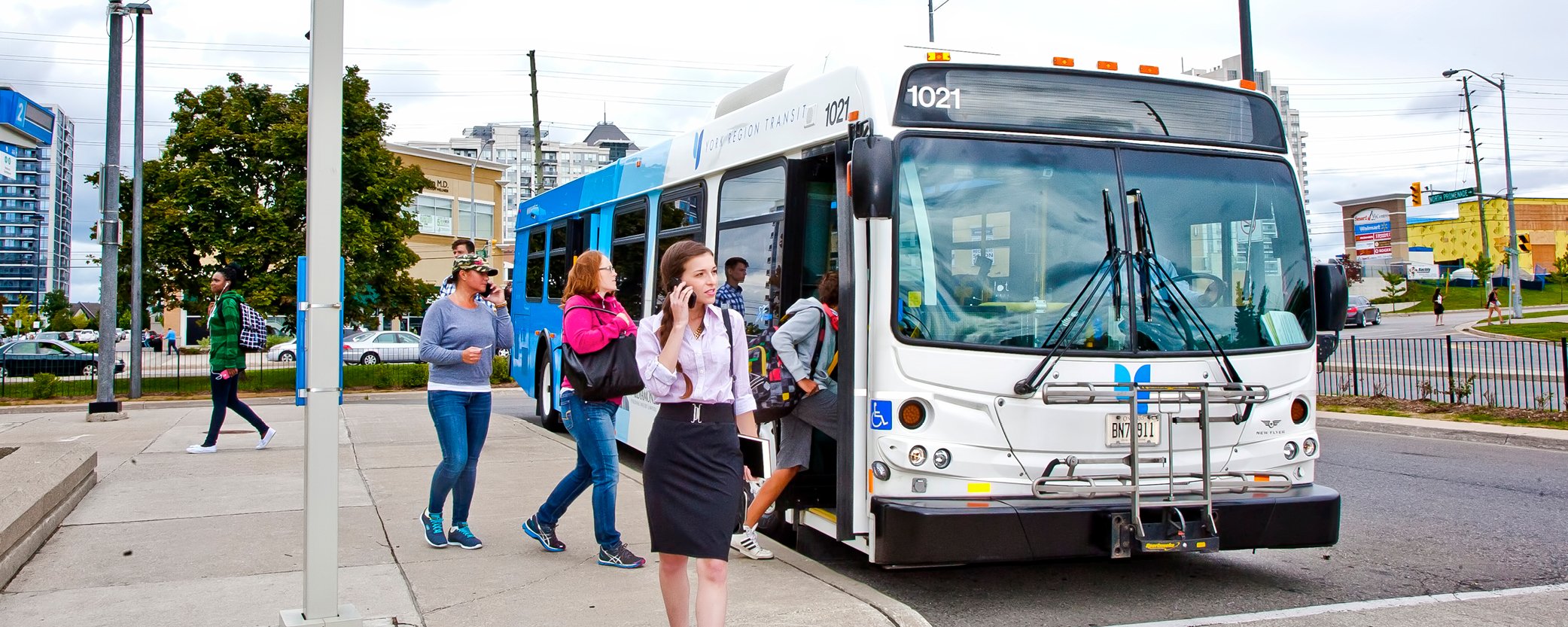 Image Banner of Business woman exiting the bus